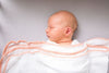 3 Pc Newborn Essential Set - Hooded Towel, Swaddle + Toy Rattle - Berkeley Haven